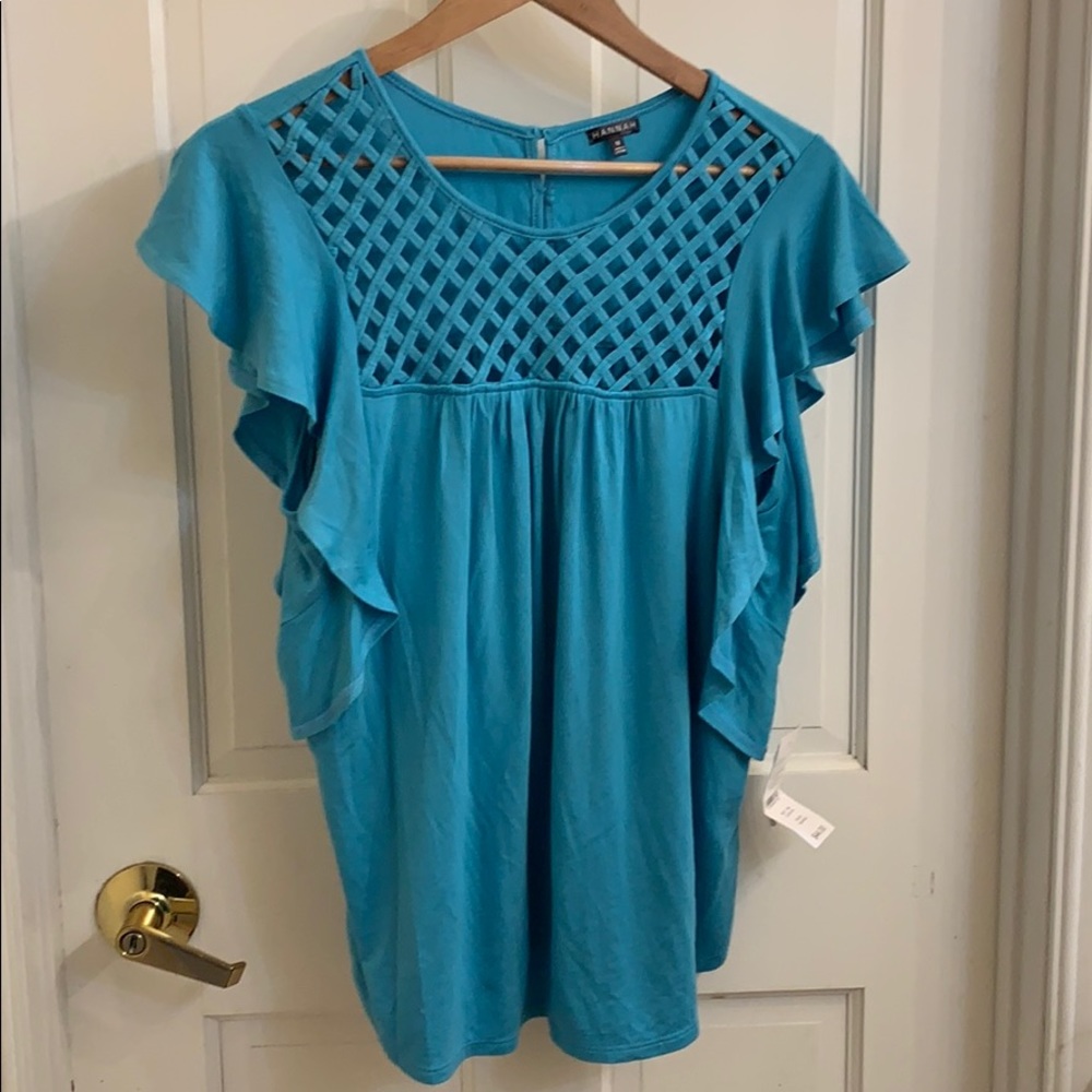 Cute flowy top. Light blue/turquoise in color. M
